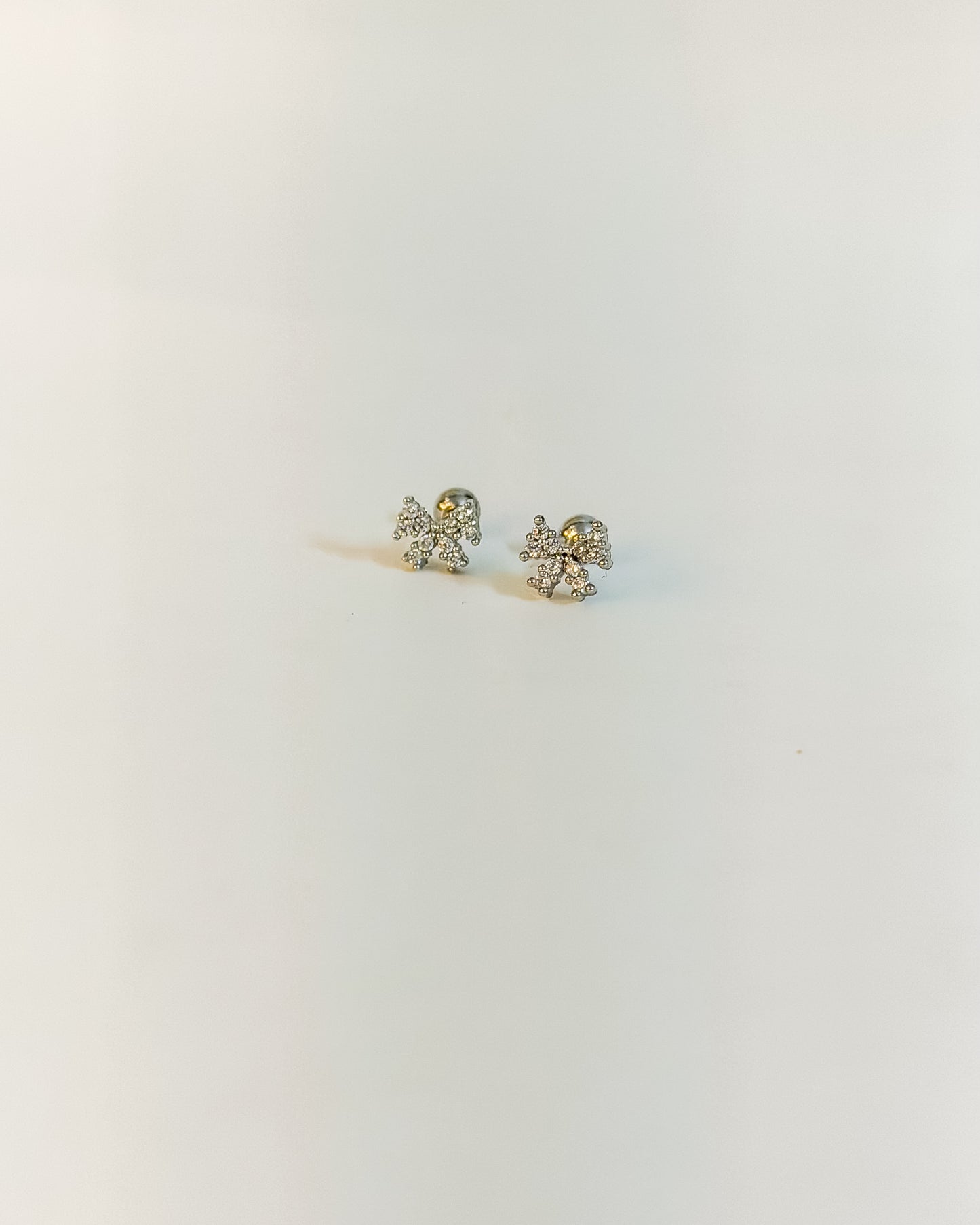 Mini bow silver ball back earrings