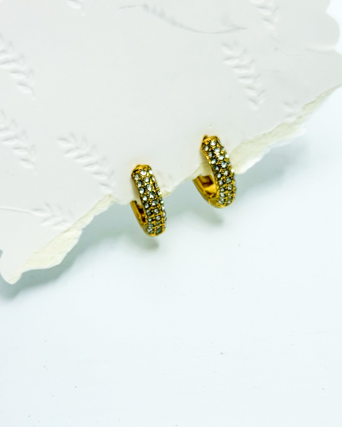Small huggies with loaded studs