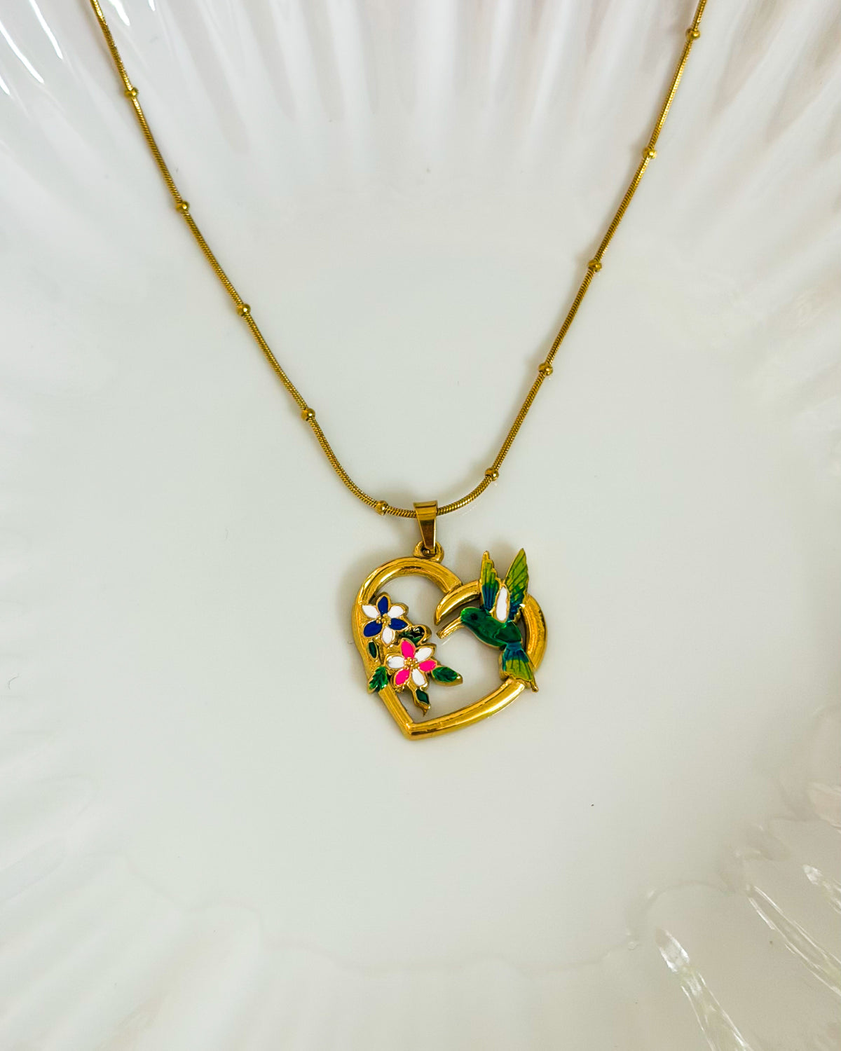 Hummingbird heart necklace