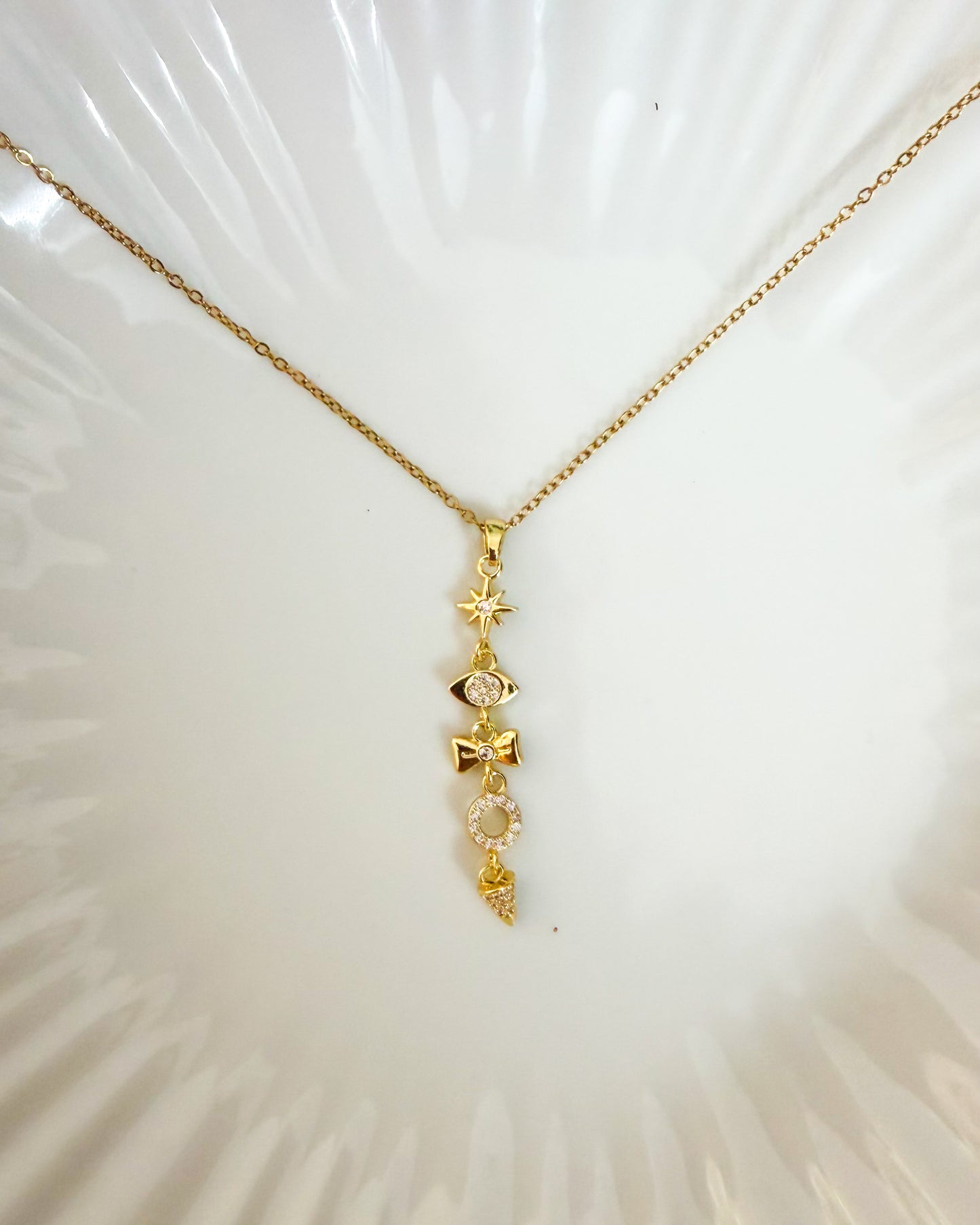 Twinkle bow hanging necklace