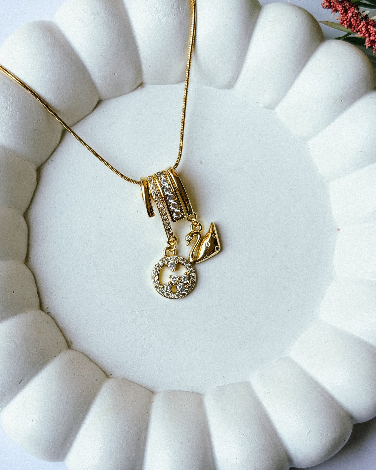 Studded swan charm necklace