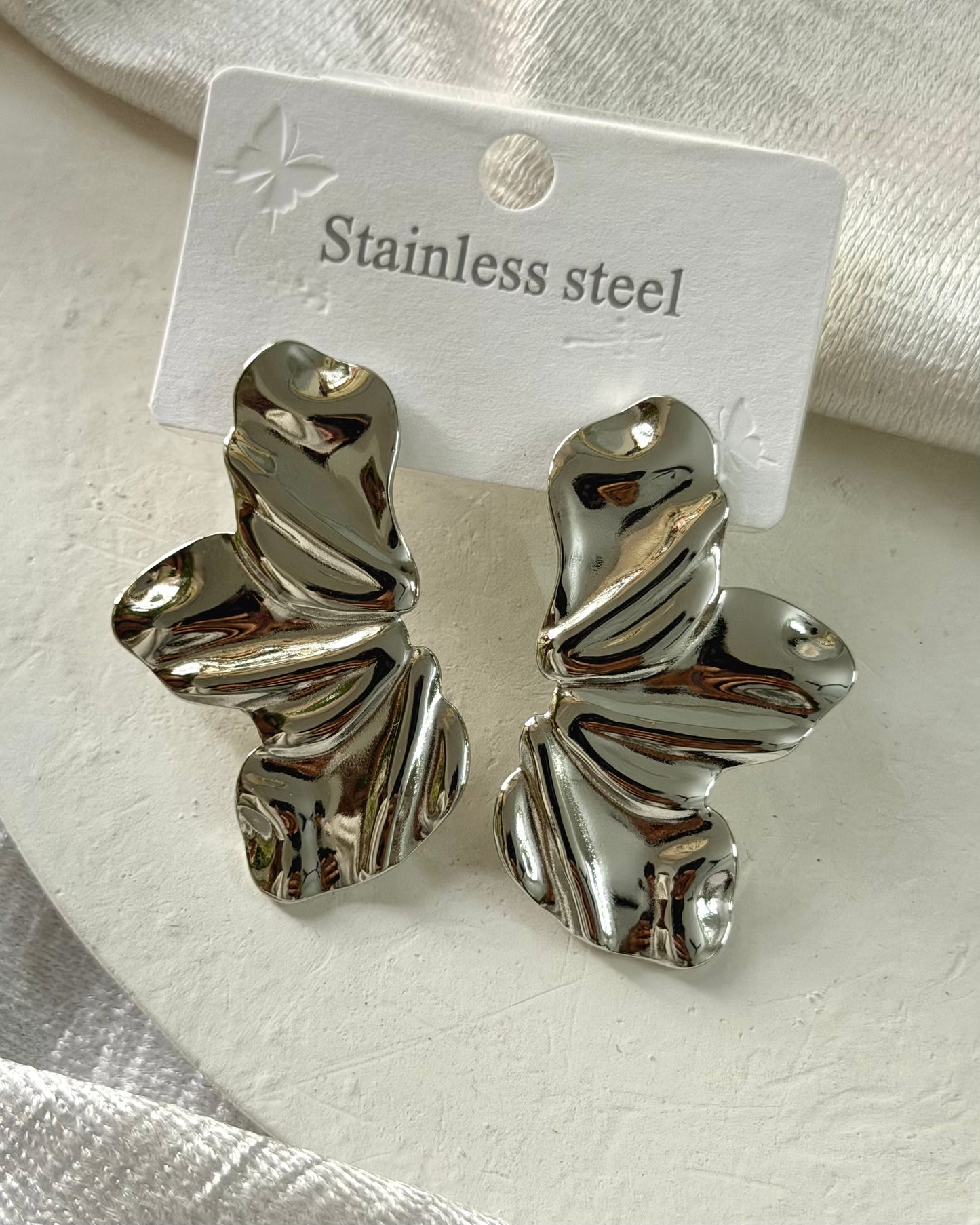 Silver Wing statement earring