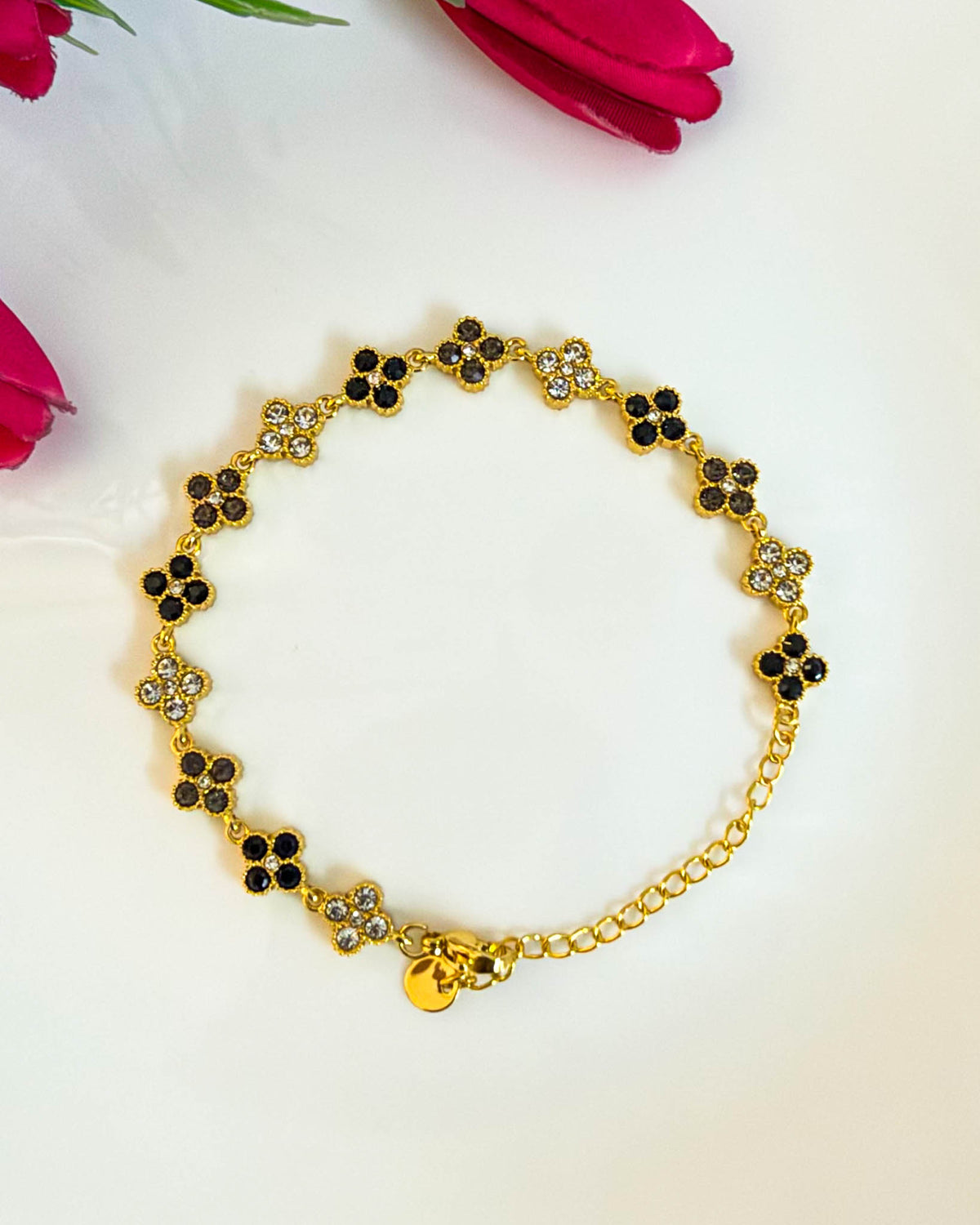 Black with white studded clover bracelet