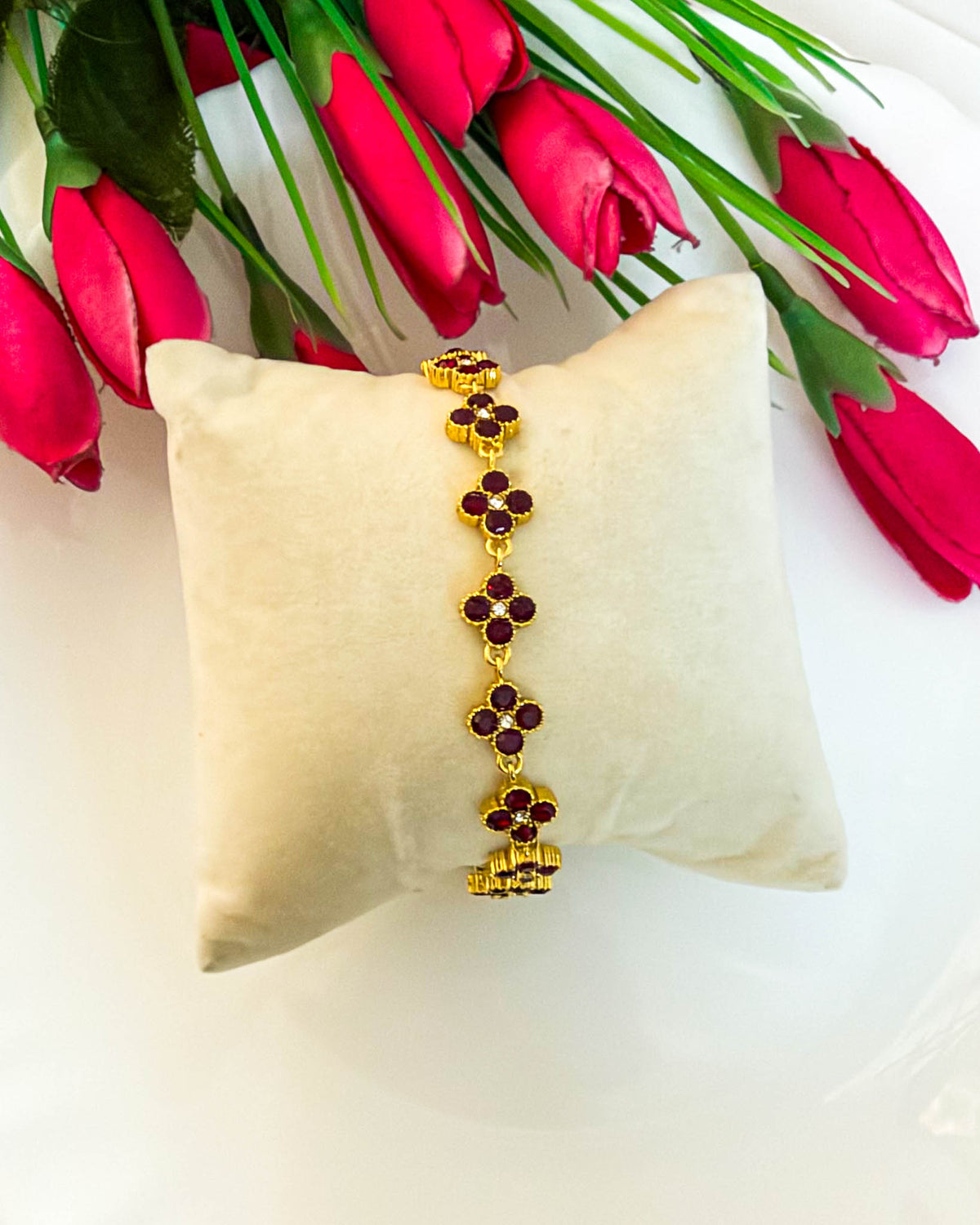 Burgundy studded clover bracelet