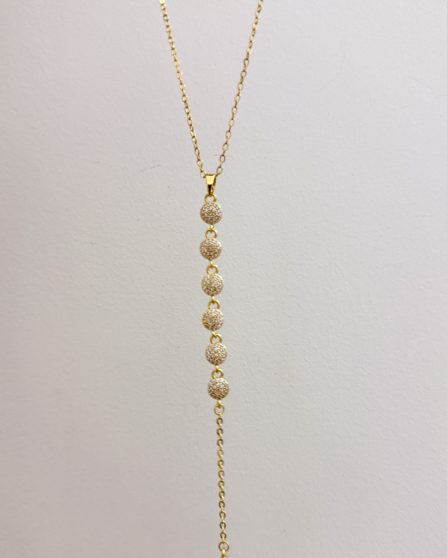 Studded long necklace