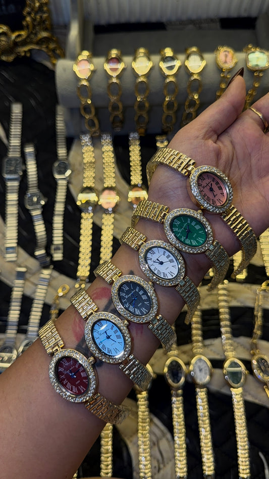Ovel studded serpent watch