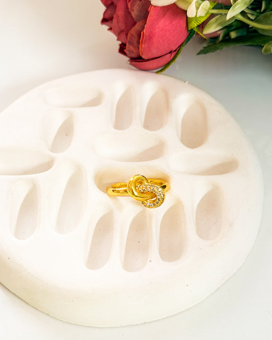 Studded knot adjustable ring