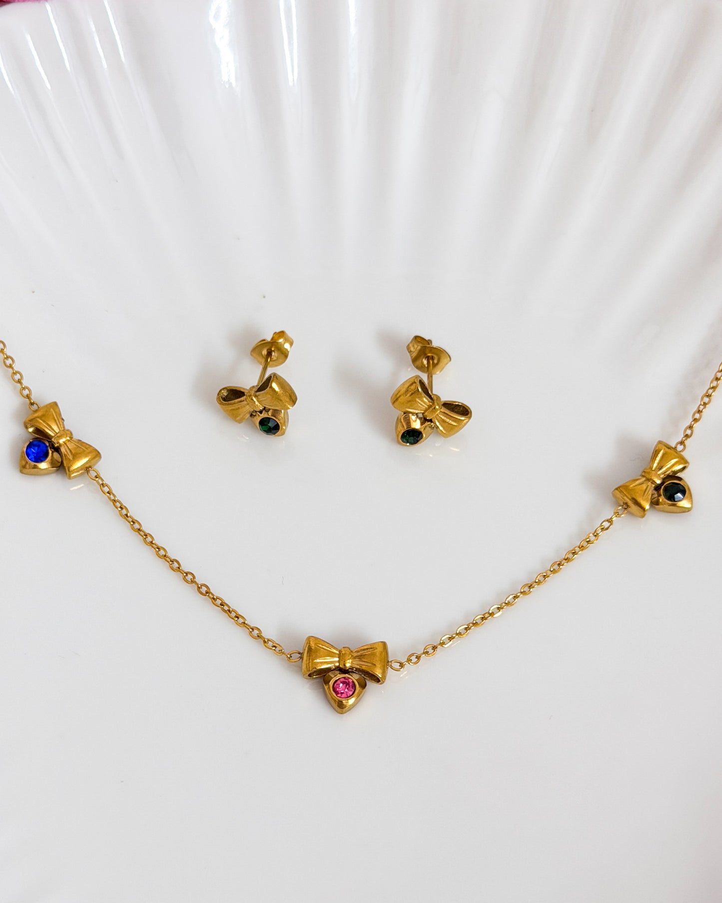 Multicoloured stone bow necklace with studs