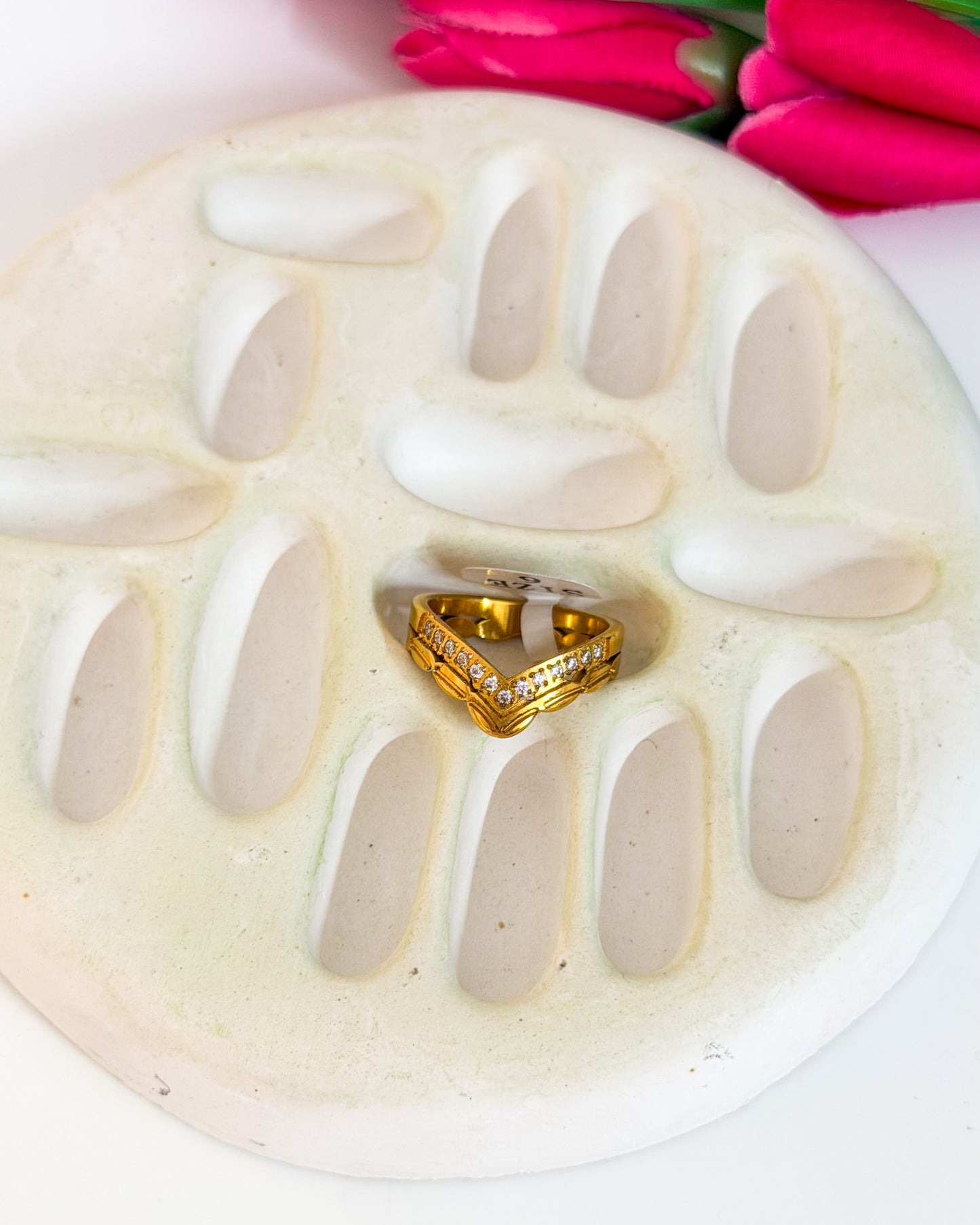 Layered studded v ring