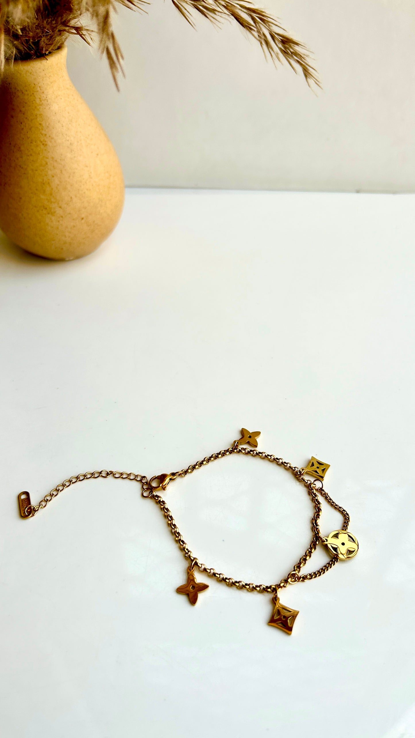 Brand inspired charm bracelet