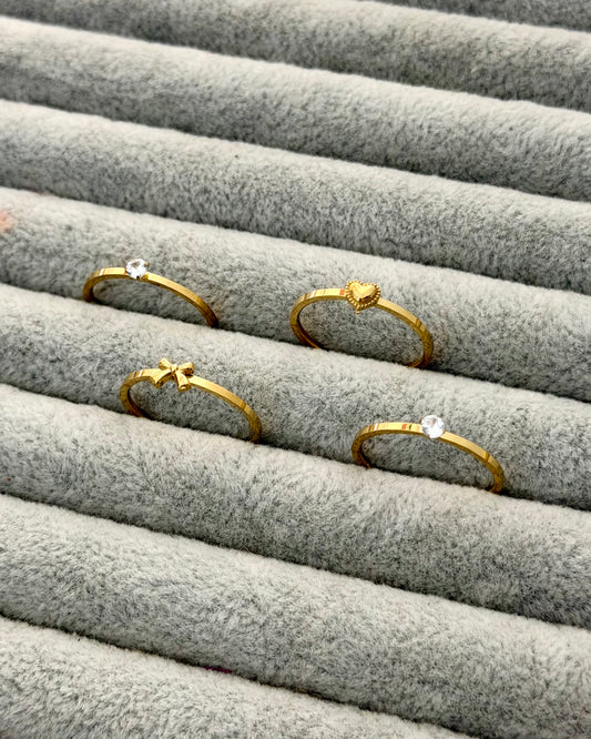 Mini bow with heart ring set of 4