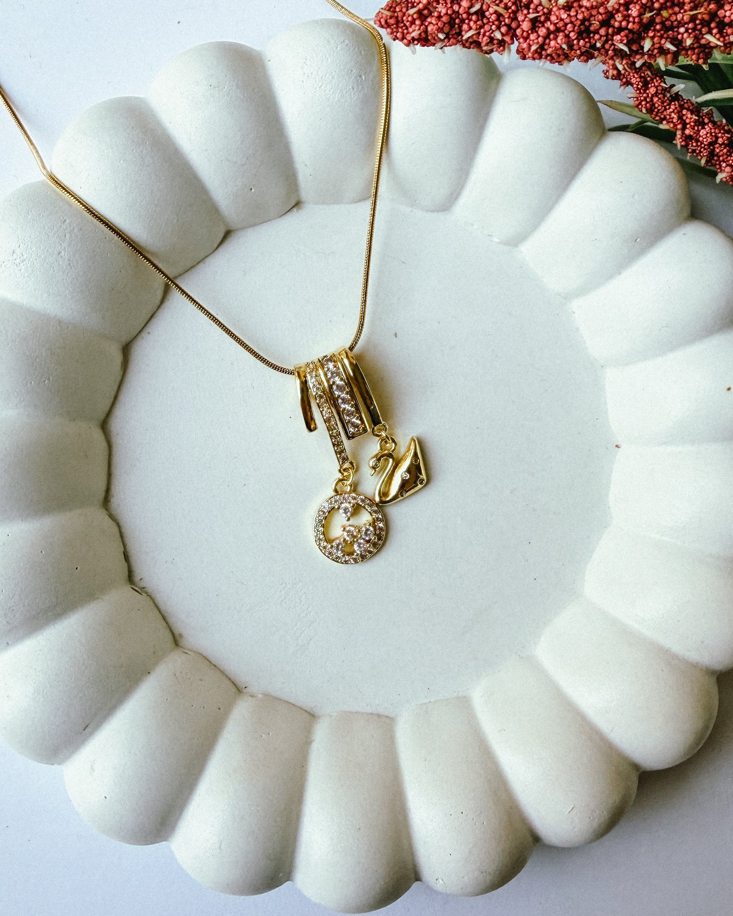 Studded swan charm necklace