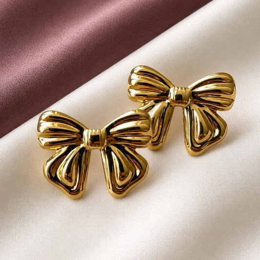 Chunky bow statement, earring ￼