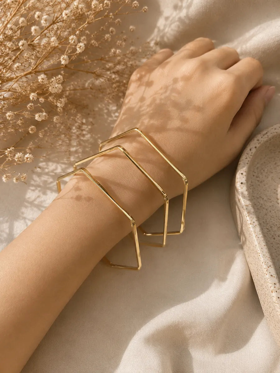 Geometric set of 3 bangles ( diameter 6cm approx , size 2.4 to 2.6)