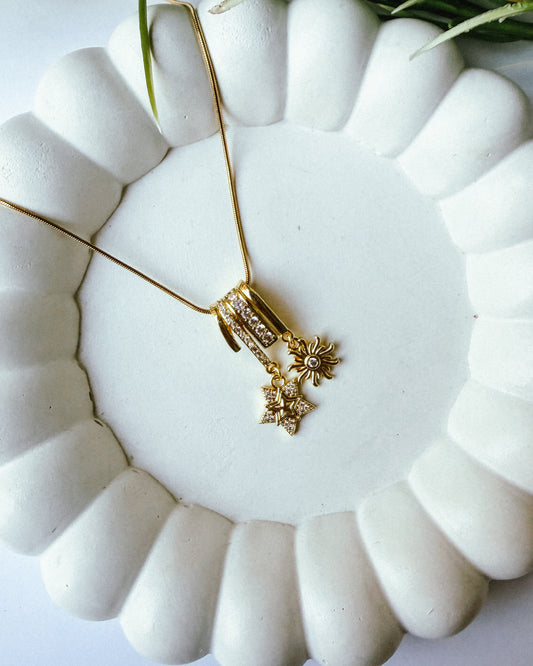 The sun & star charm necklace