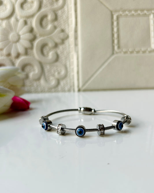 Silver magnetic evil eye bracelet.