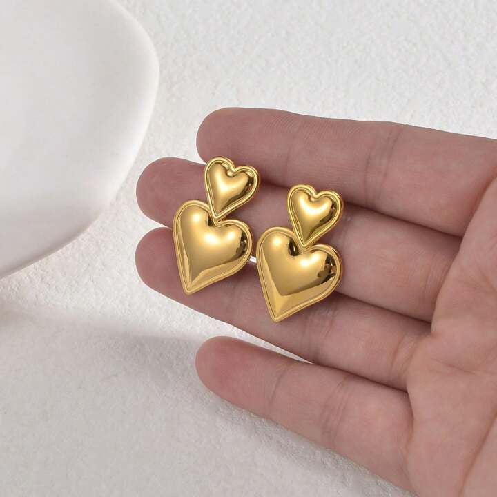 Double heart statement, earring ￼