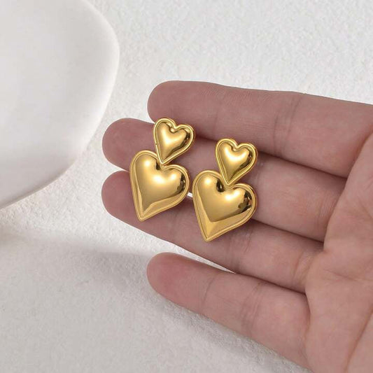 Double heart statement, earring ￼