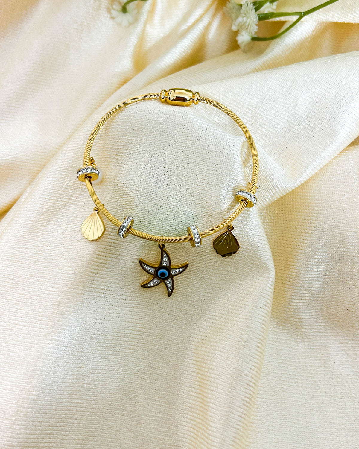 Evil eye starfish charm bracelet