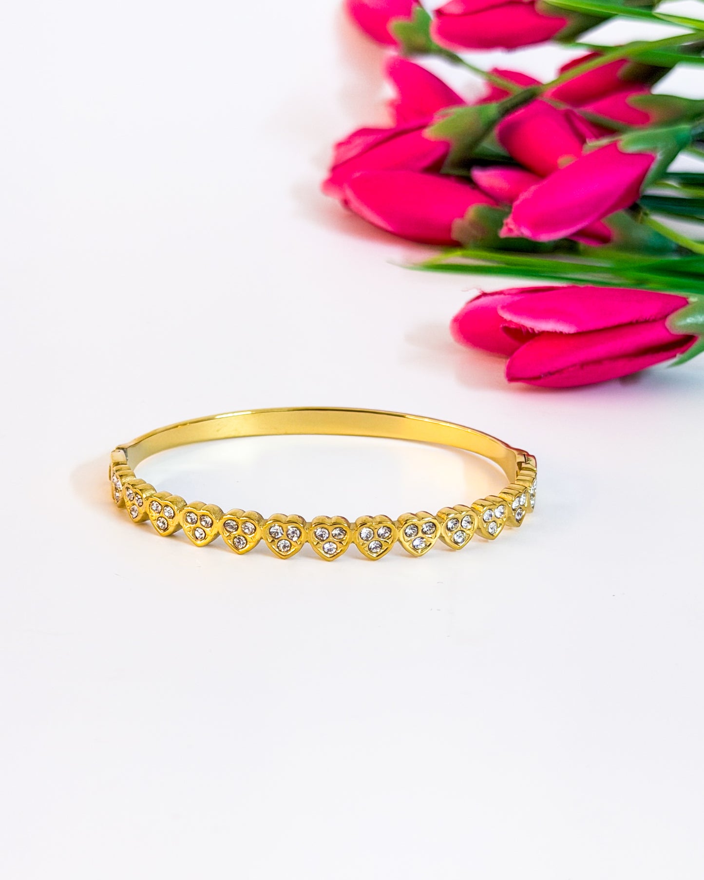 Cluster studded heart bracelet