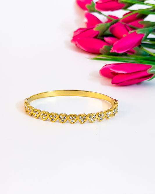 Cluster studded heart bracelet