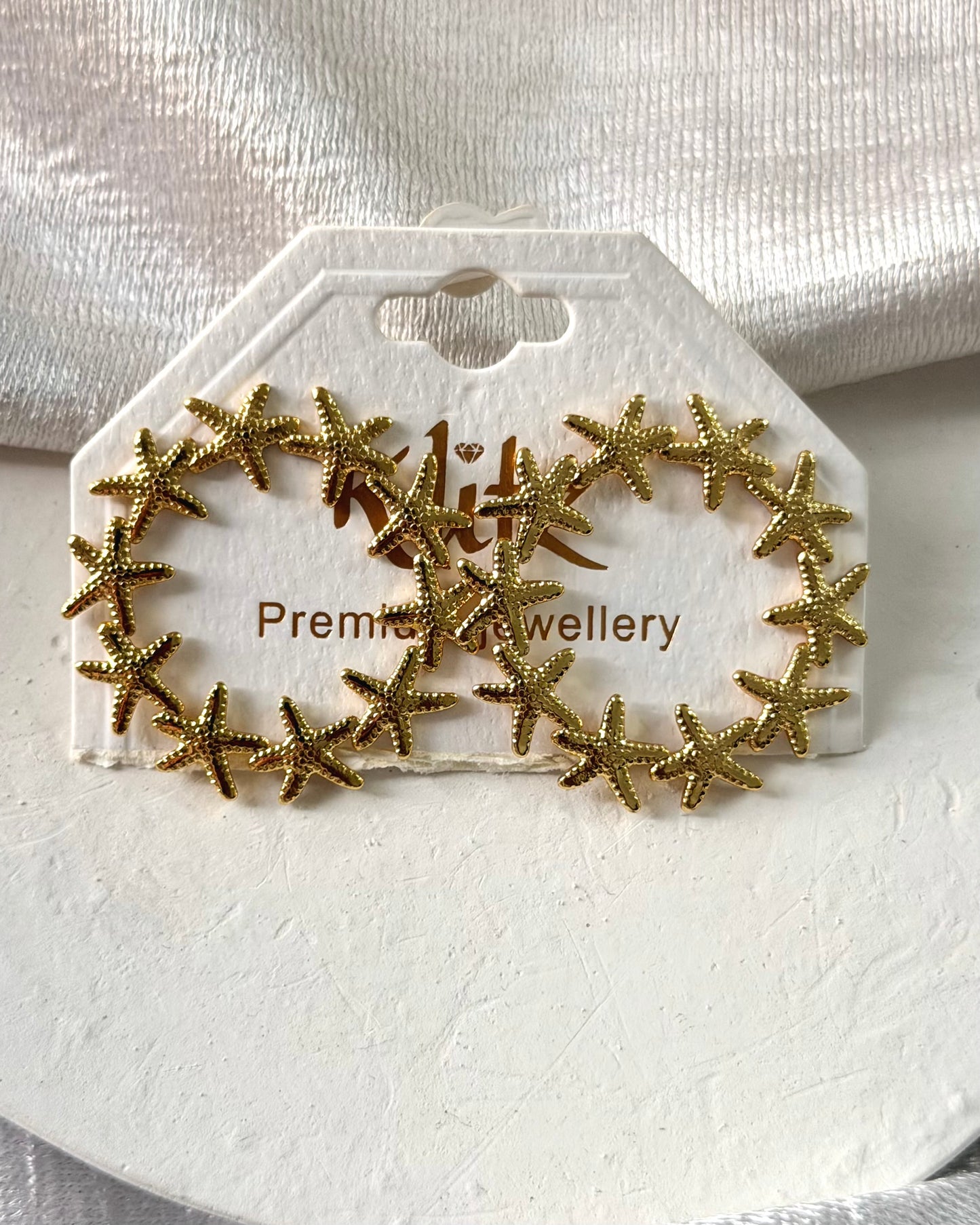 Starfish statement earrings