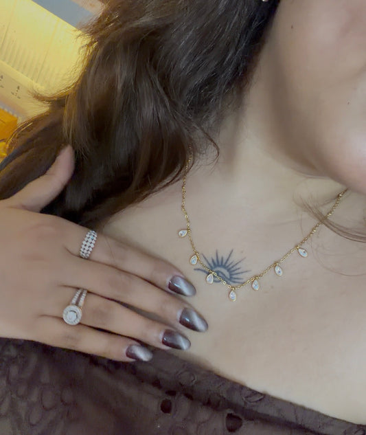 The drop charm necklace