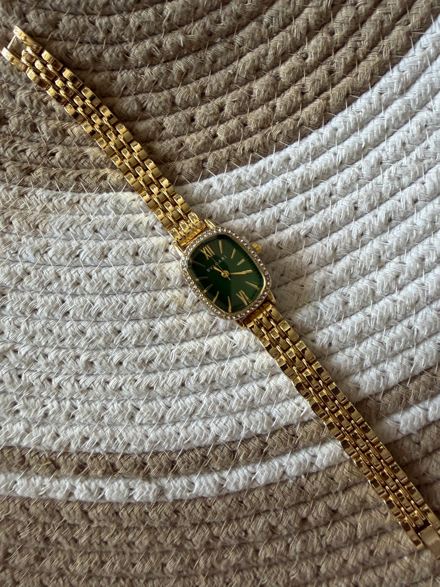 Studded Bvlgari square green dial watch