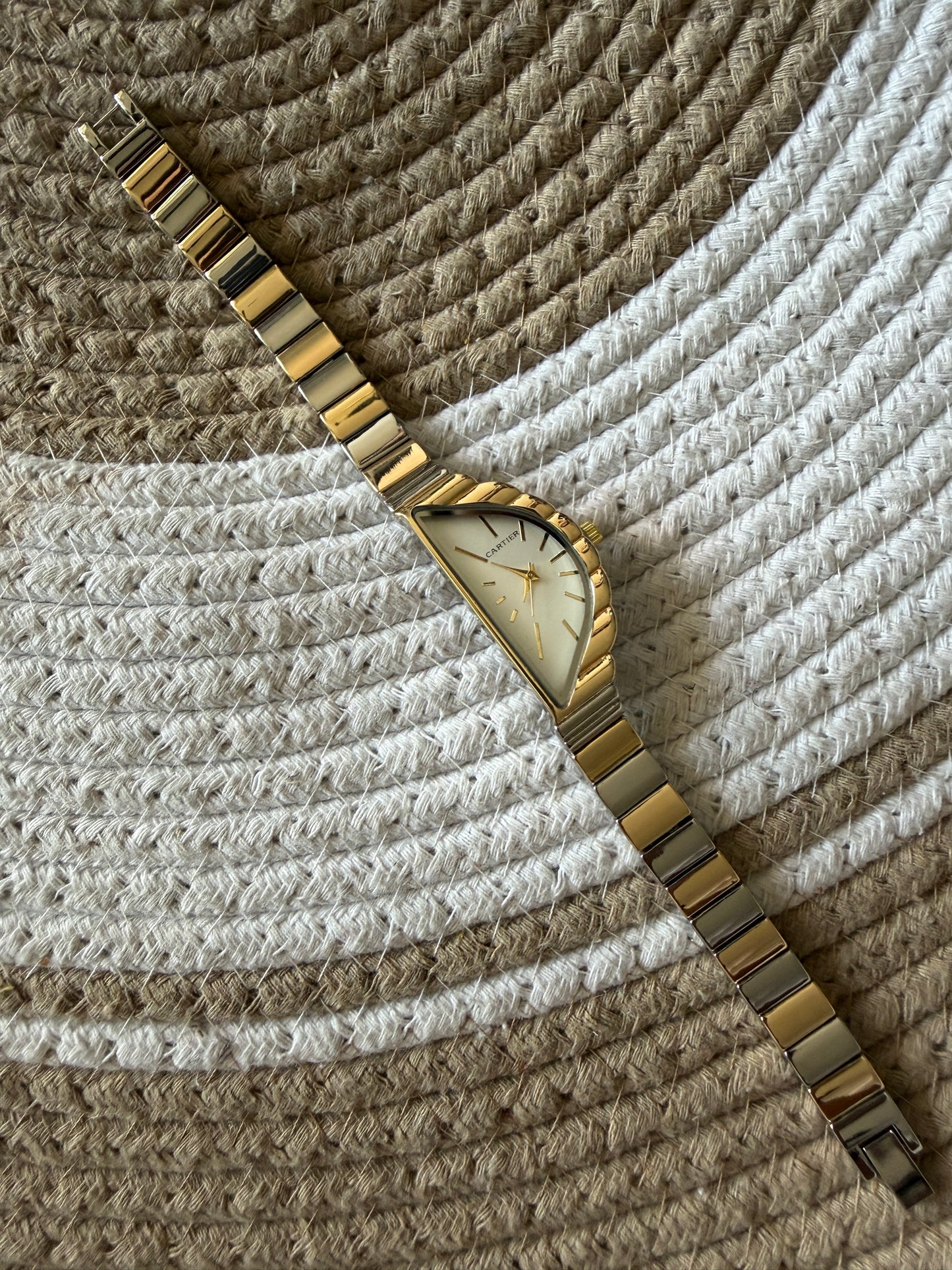 Cartier half moon cream dial watch