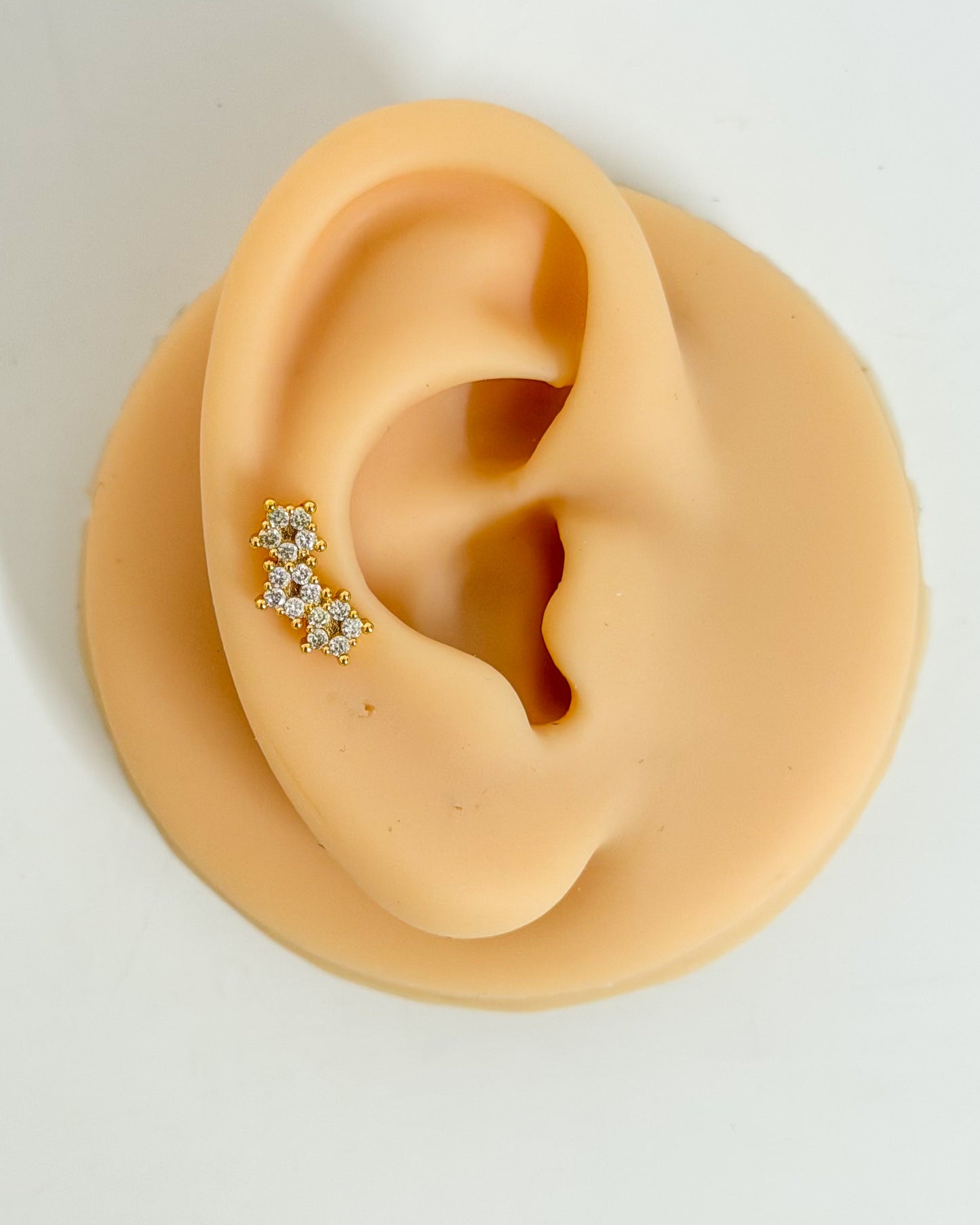 Three designer flower ball back studs