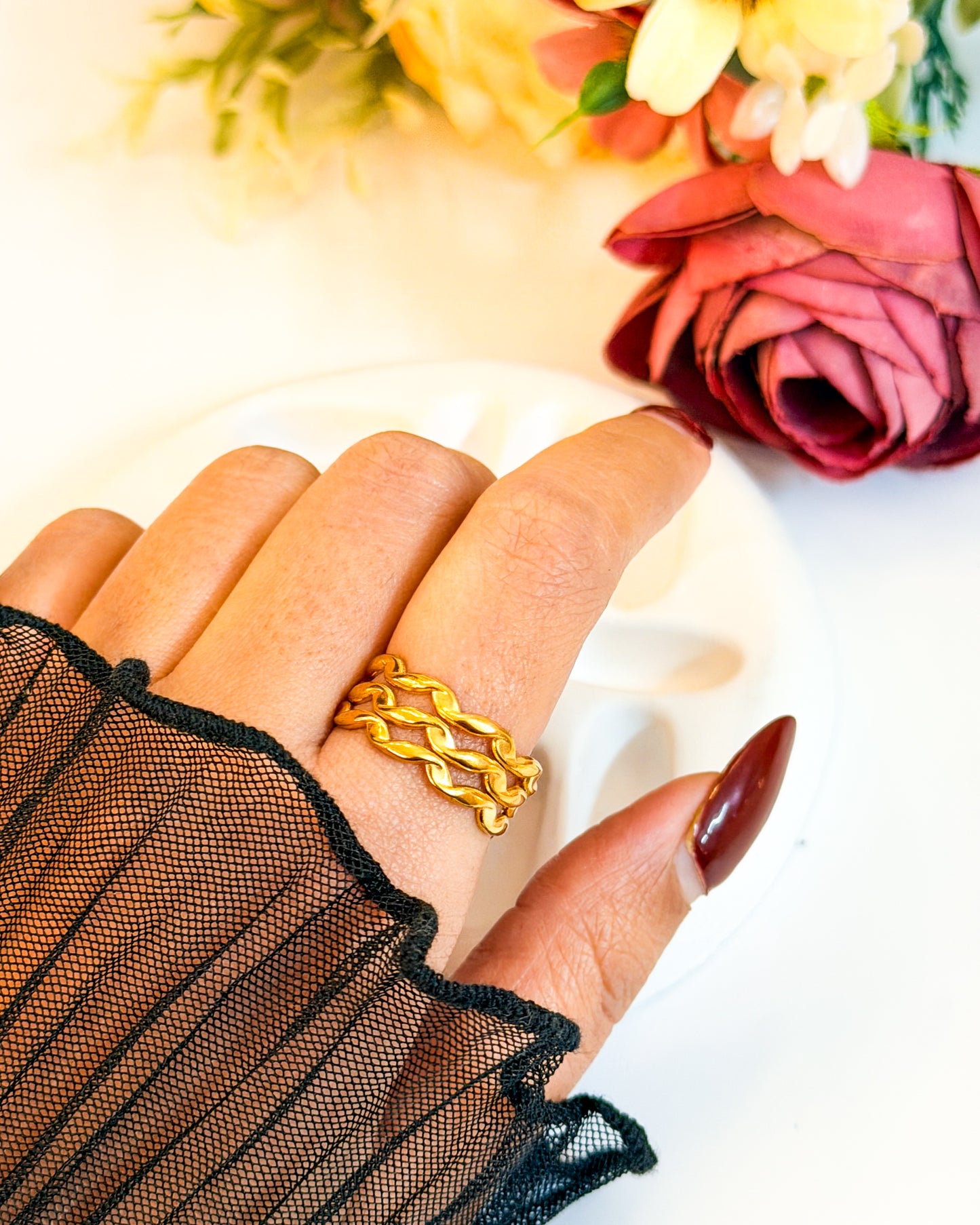 Twisted layered adjustable ring