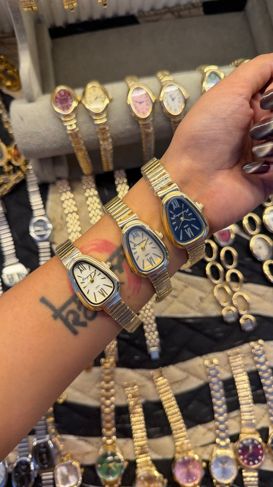 Triangle dial watch ￼