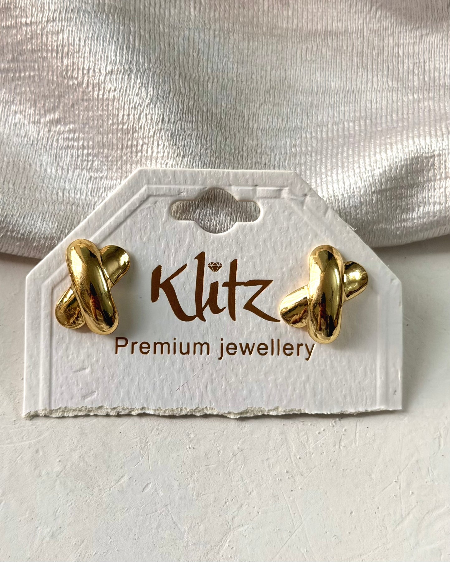 Knot statement earrings