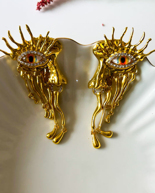 Statement eye earrings