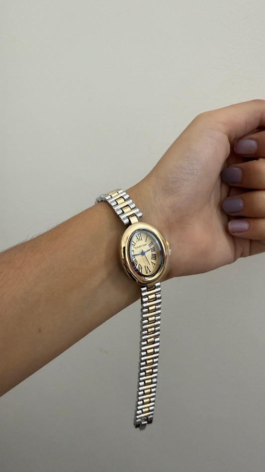Cartier oval gold dial watch