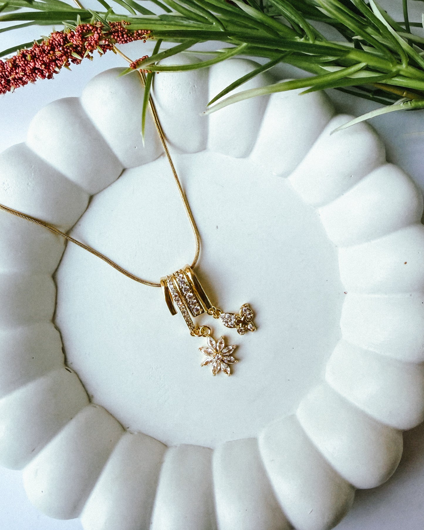 Floral butterfly charm necklace