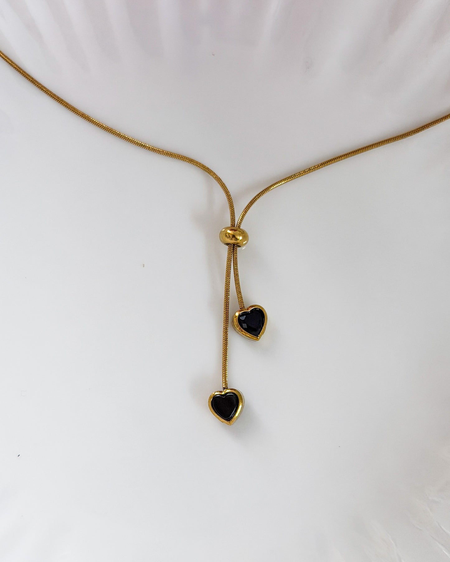 Adjustable black stone hanging necklace