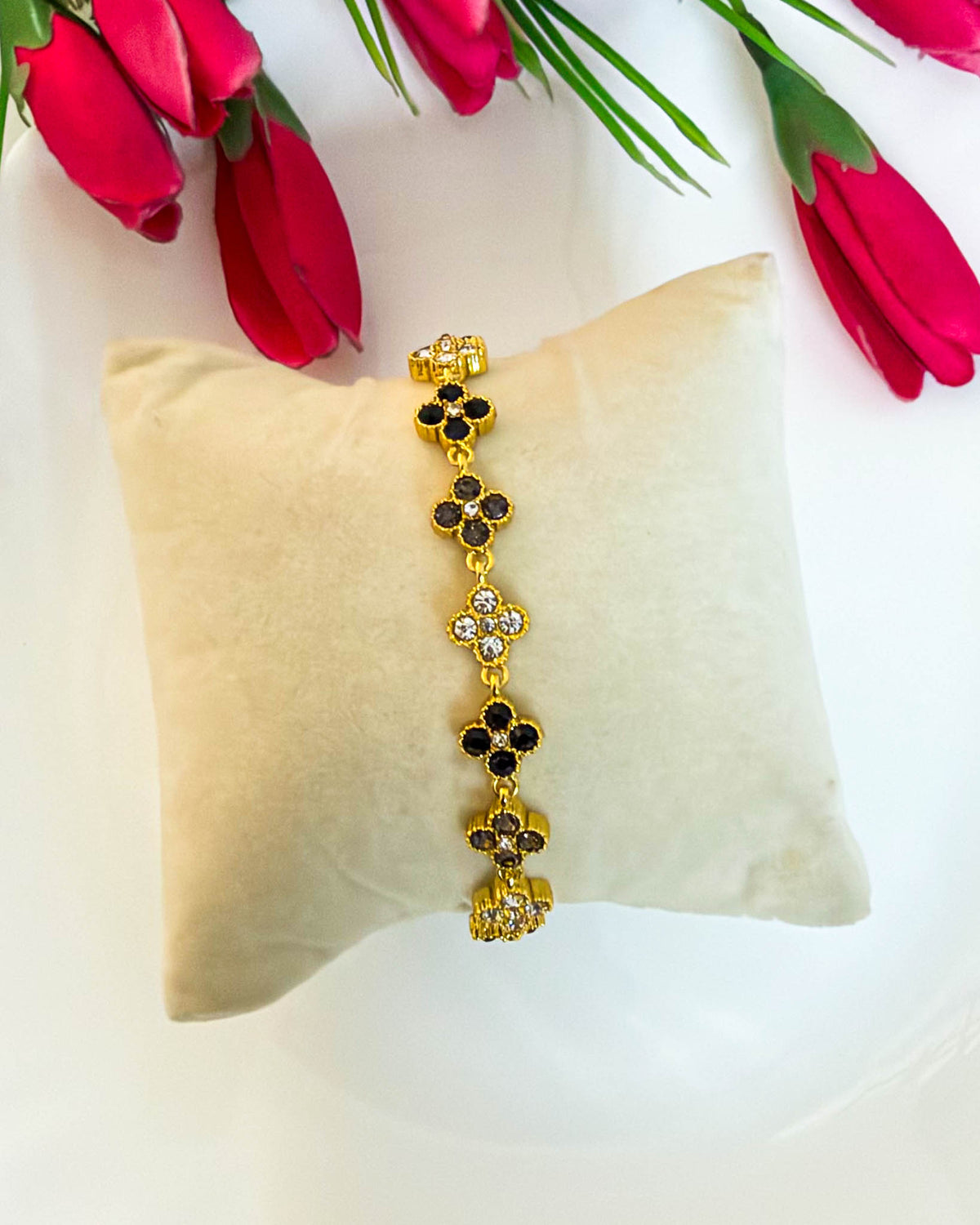 Black with white studded clover bracelet