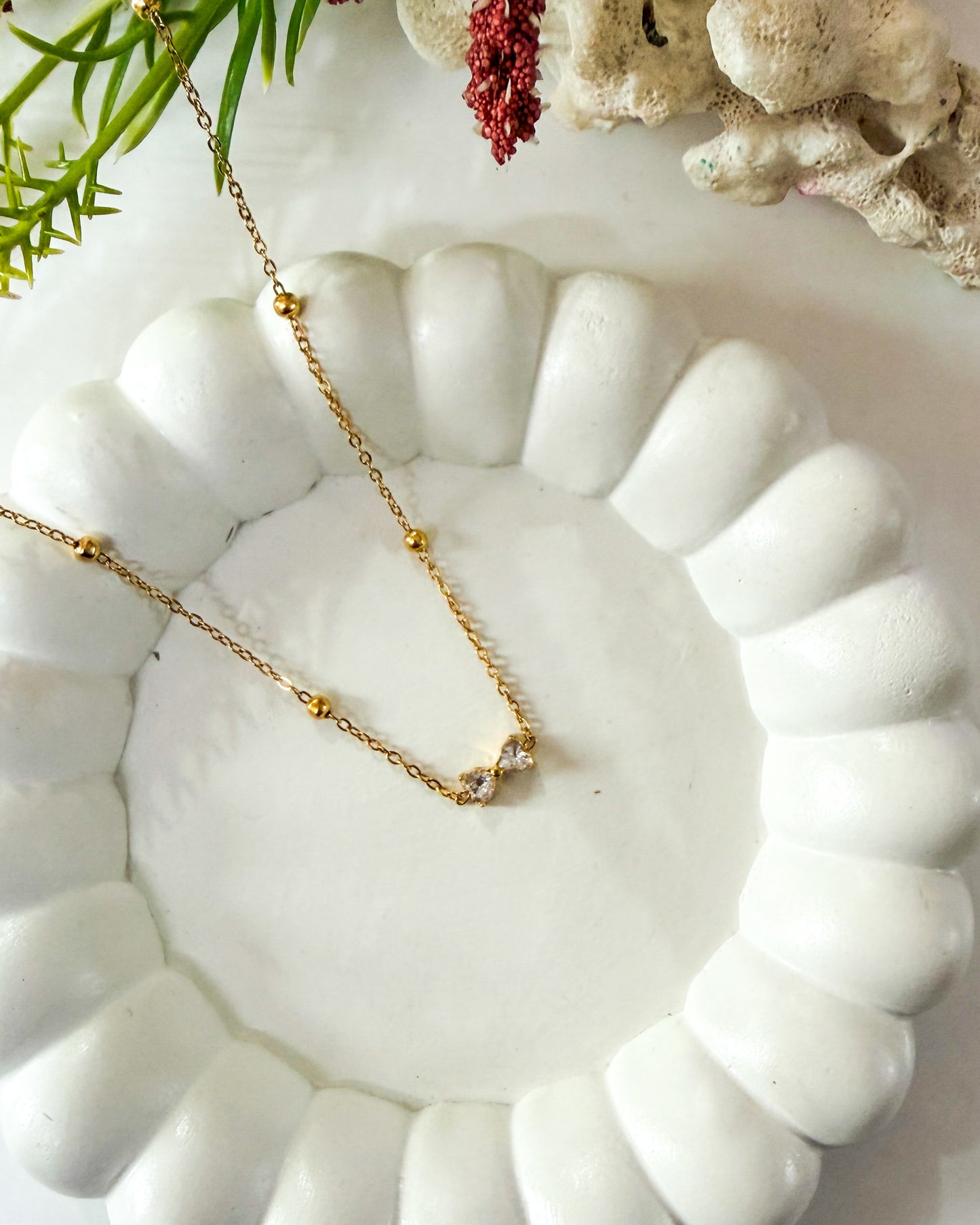 Mini studded bow necklace