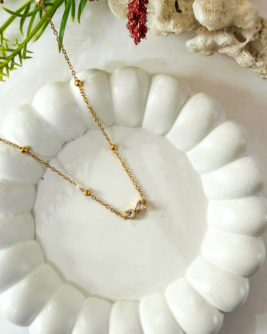 Mini studded bow necklace