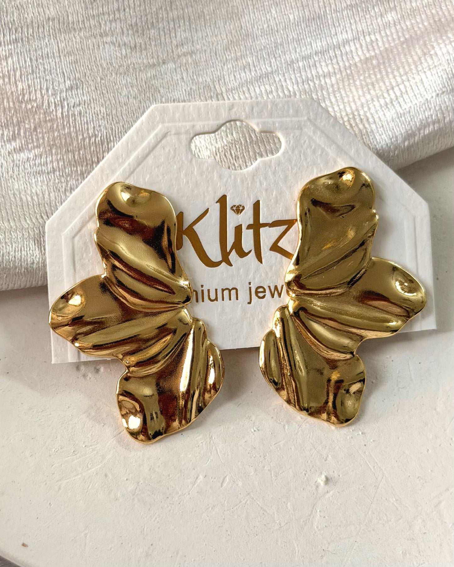 Wing statement earrings