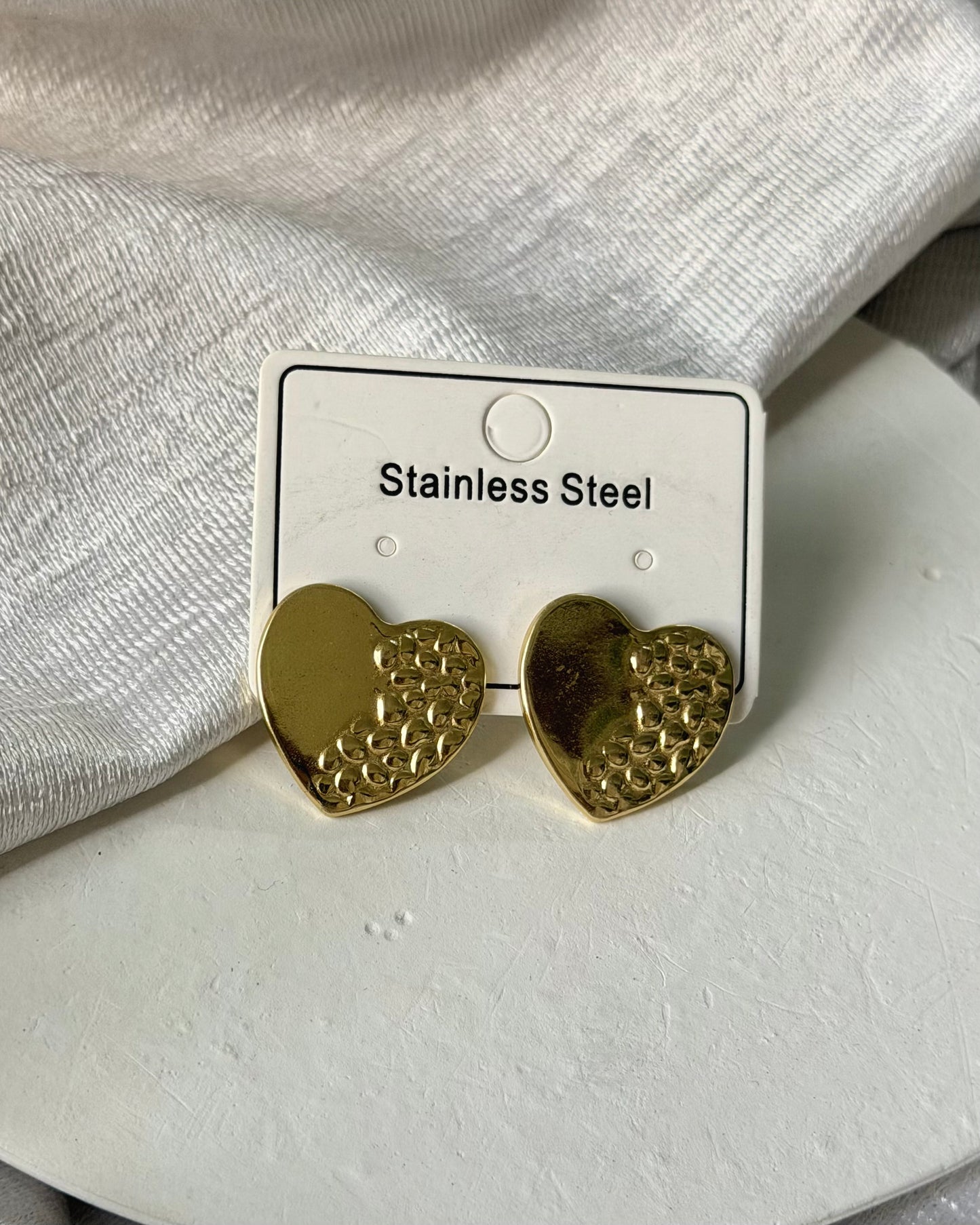 Dotted heart statement earrings