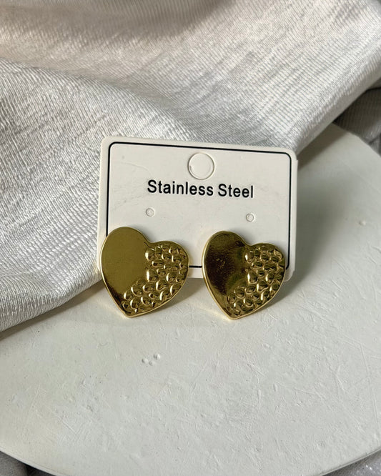 Dotted heart statement earrings