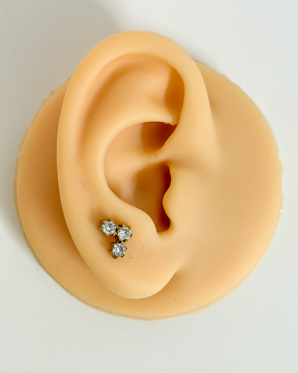 Three stone ballback studs (Ss)