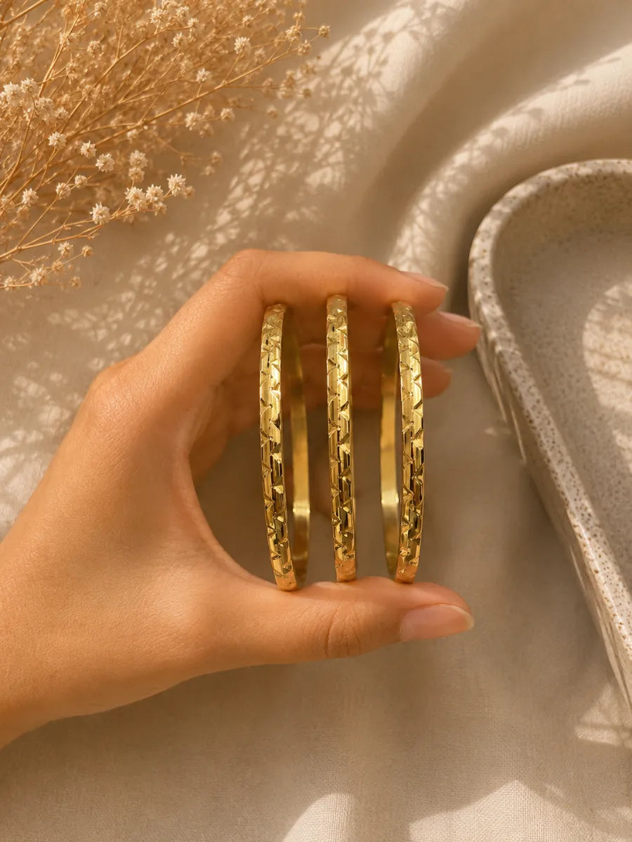 Textured set of 3 bangles ( diameter 6cm approx , size 2.4 to 2.6)