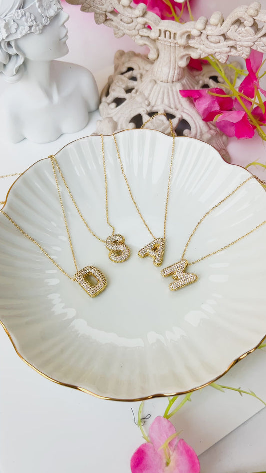 Initial studded charm necklace